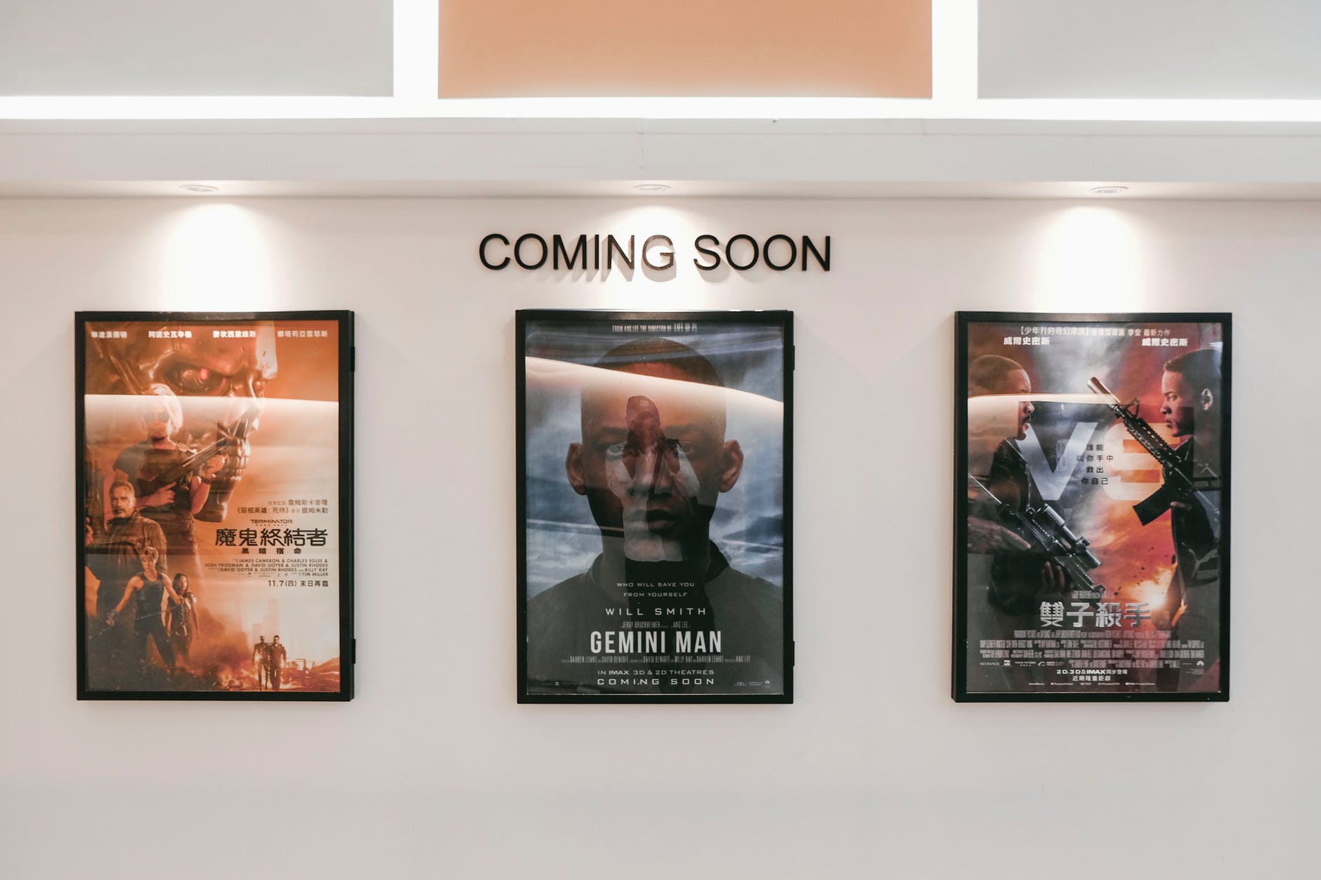 three assorted movie posters